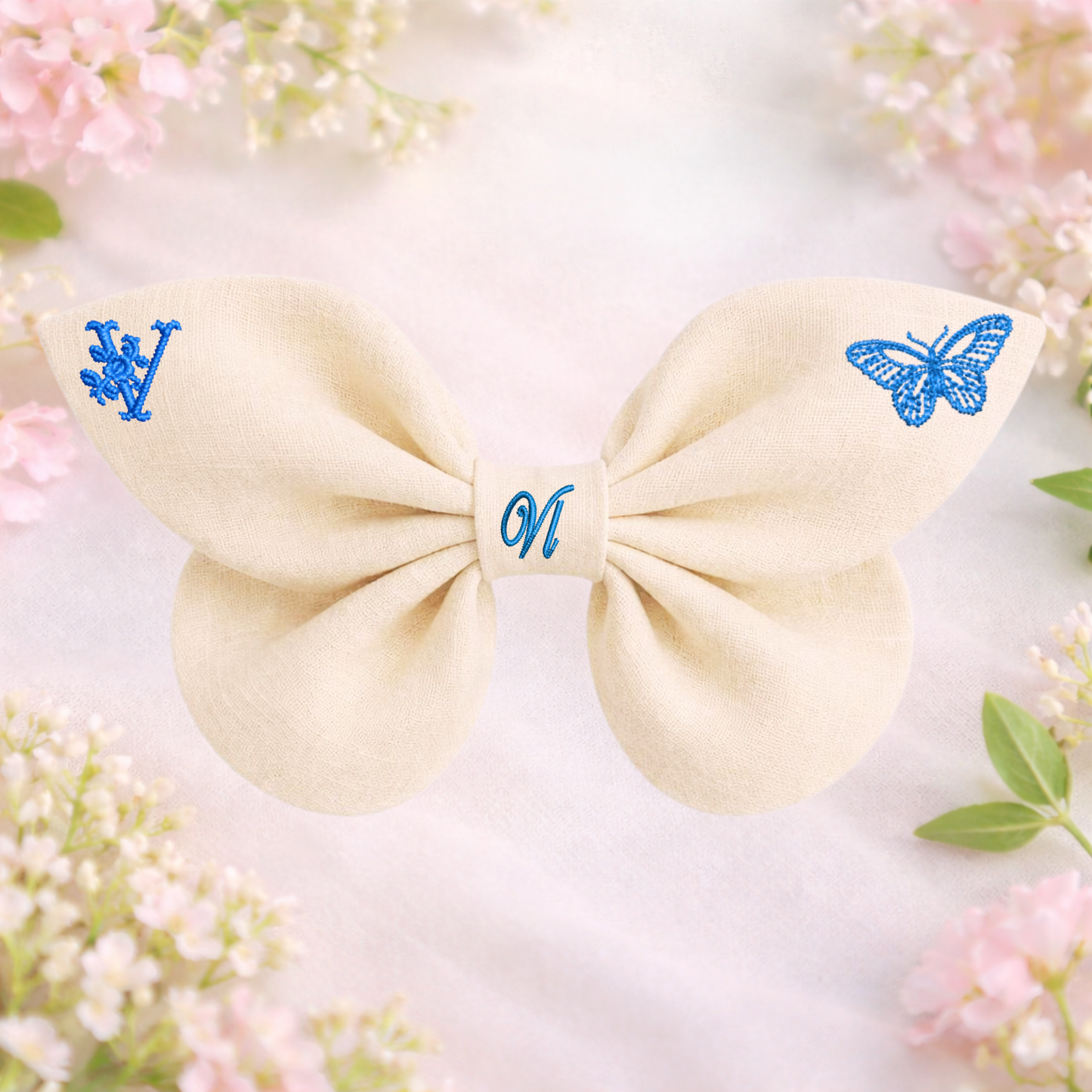 Linen bow with butterfly embroidery and monogram A, B, C ... Z. Spring 