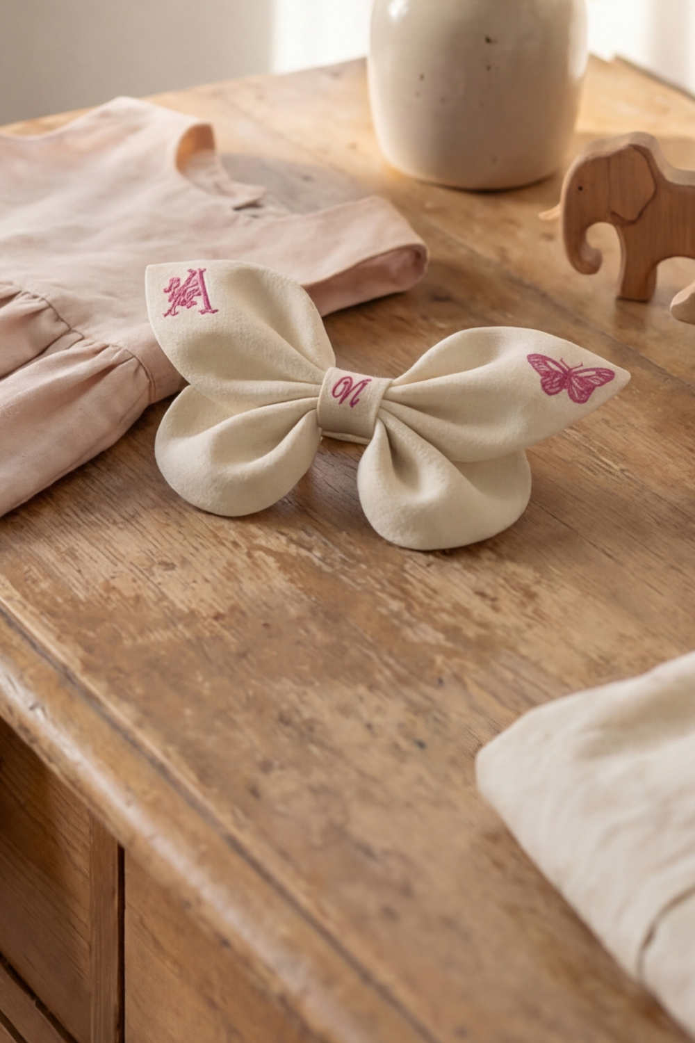 Linen bow with butterfly embroidery and monogram A, B, C ... Z. Spring 