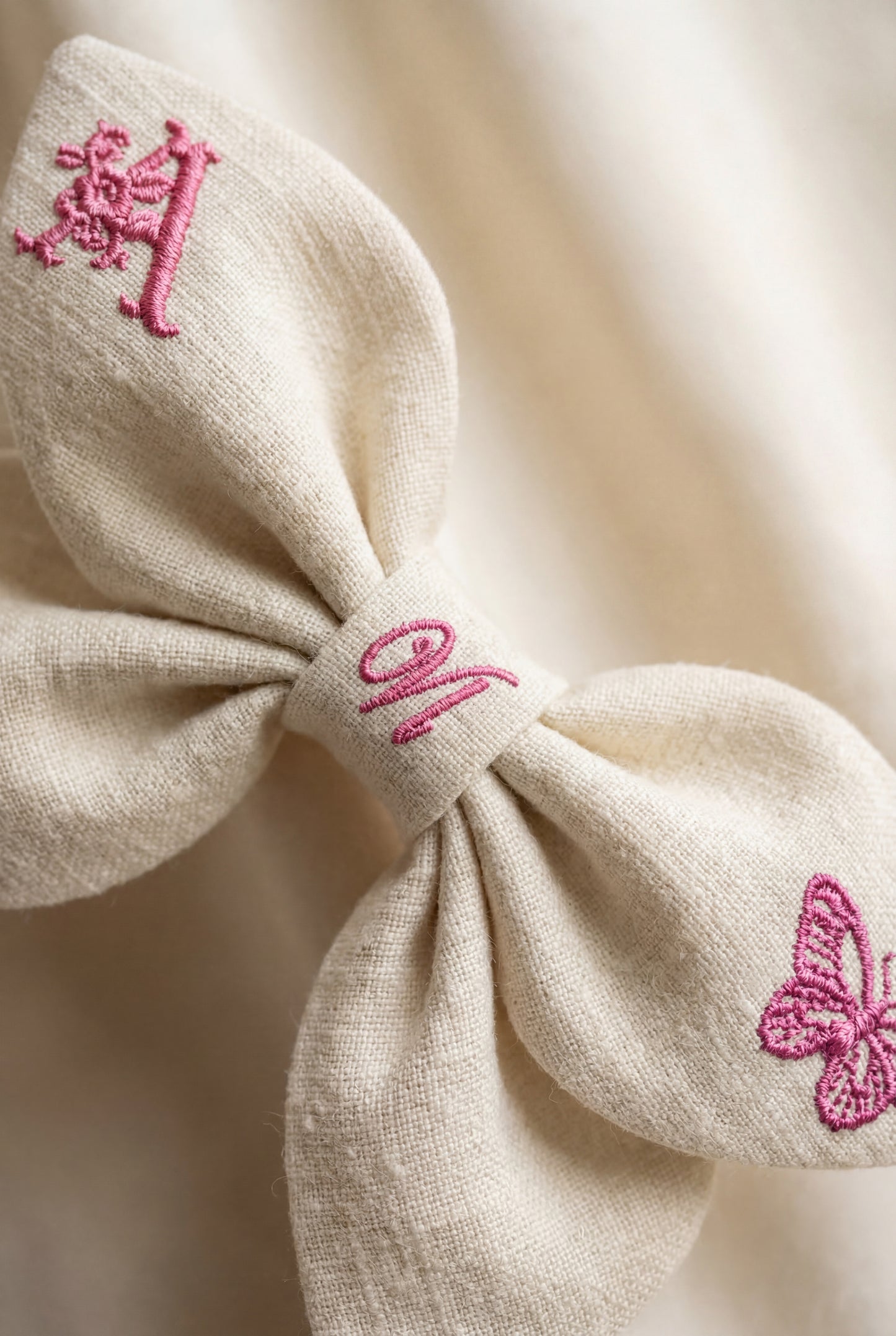 Linen bow with butterfly embroidery and monogram A, B, C ... Z. Spring 